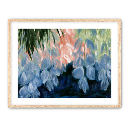 Blue flowers under green leaves