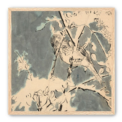 Quiet bird in berry branches