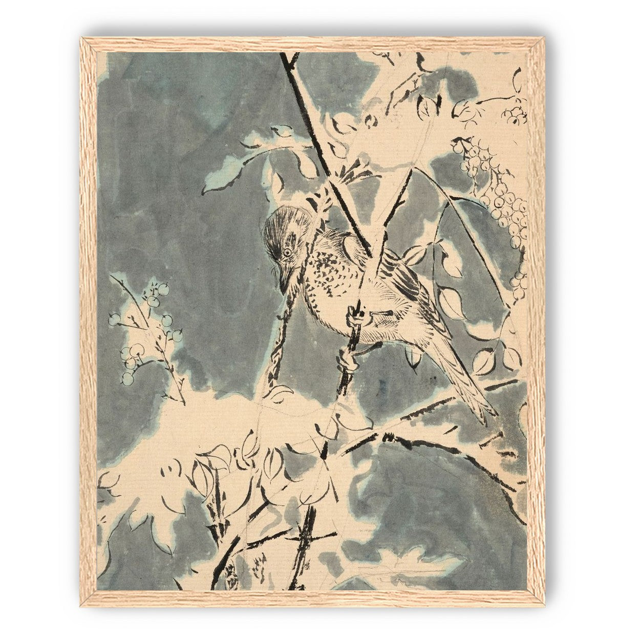 Quiet bird in berry branches