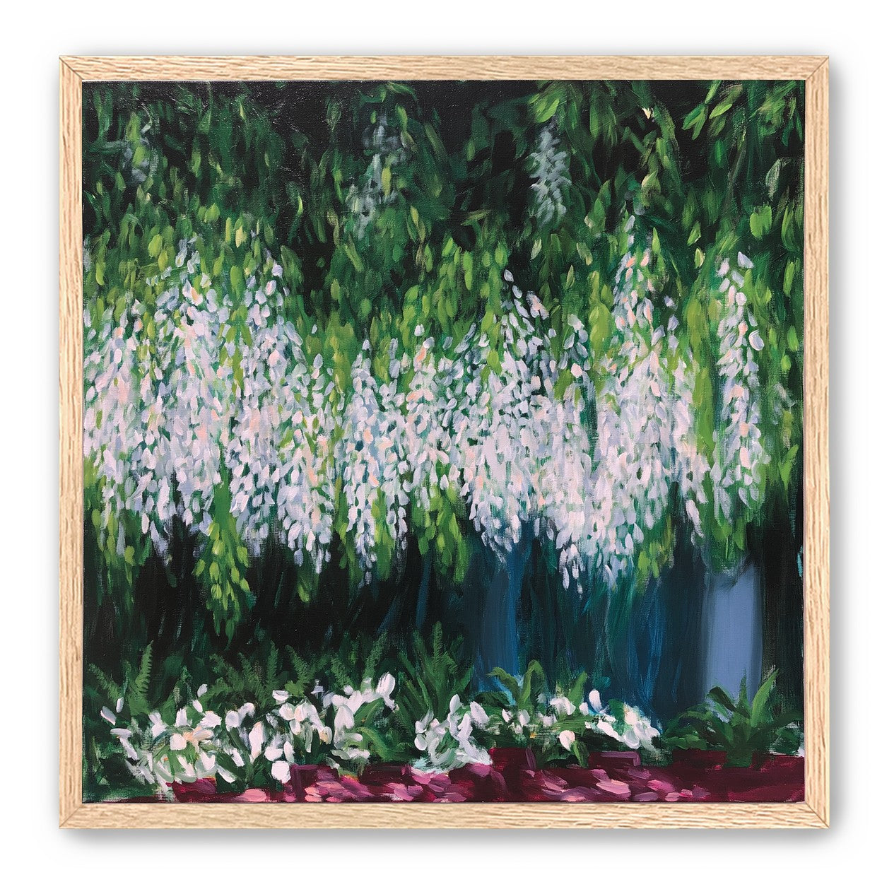 Pale blossoms in green shade