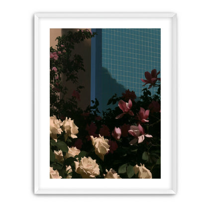 Flowers beneath the tiled wall