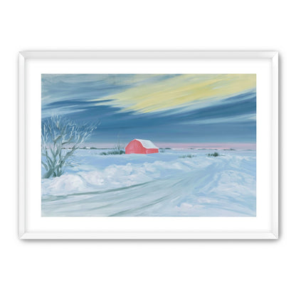 Red barn beneath winter sky
