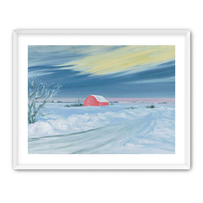 Red barn beneath winter sky