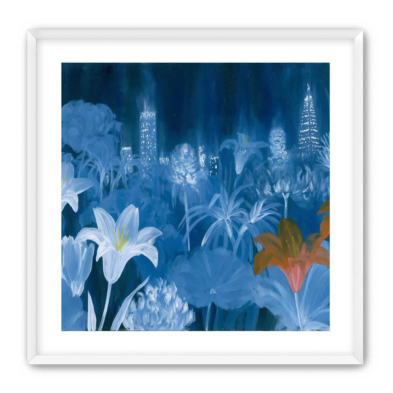 City lights behind lilies