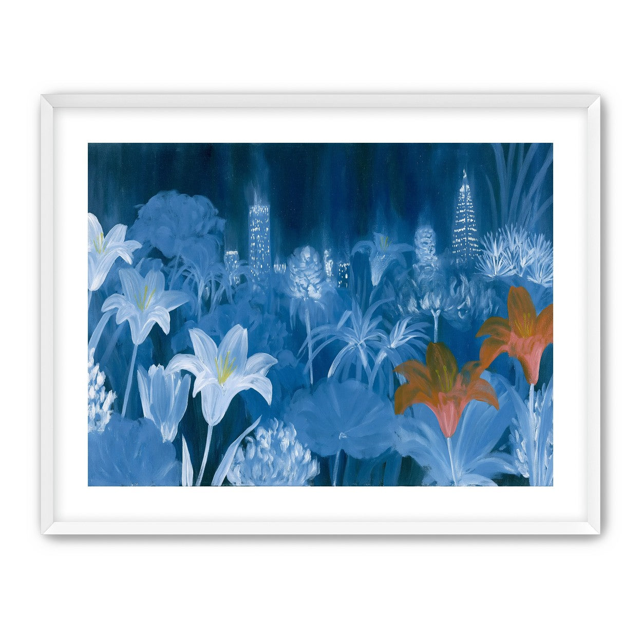 City lights behind lilies