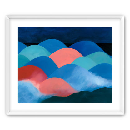 Pink moon among blue hills