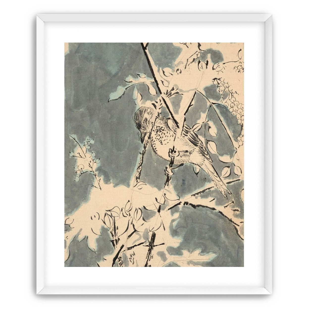 Quiet bird in berry branches