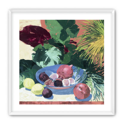 Blue bowl under palm frond