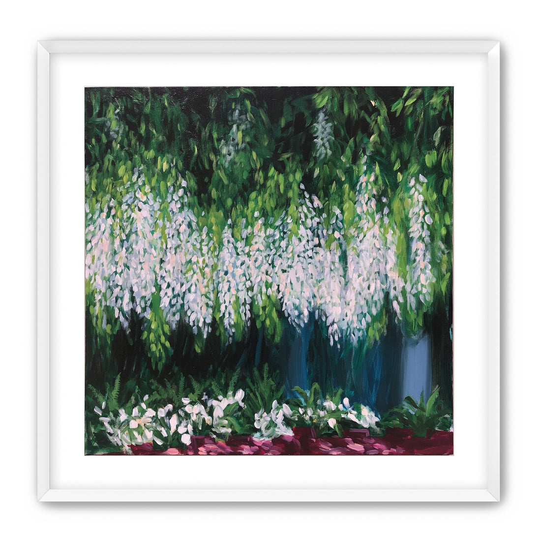 Pale blossoms in green shade