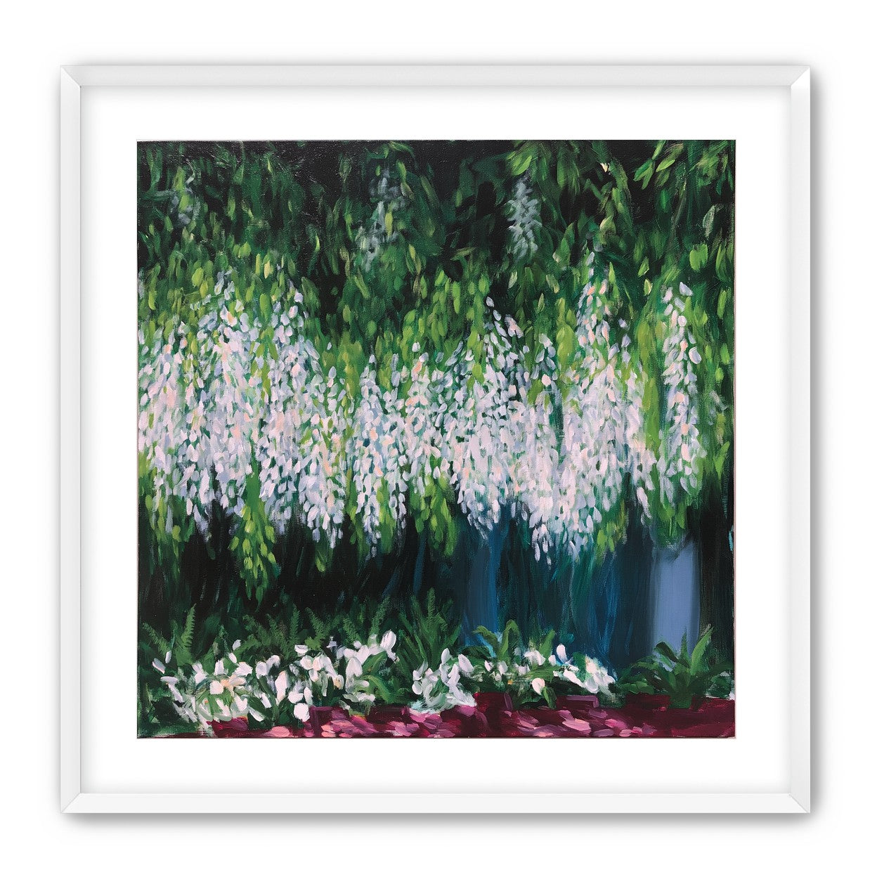 Pale blossoms in green shade