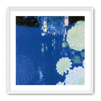 White blooms on blue canal