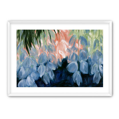 Blue flowers under green leaves