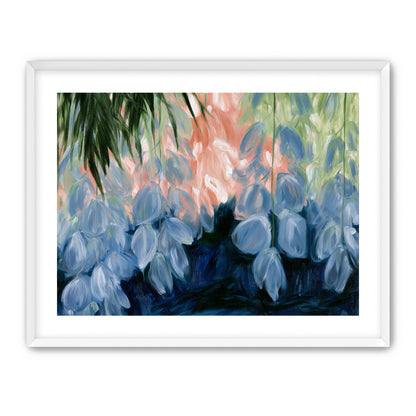 Blue flowers under green leaves