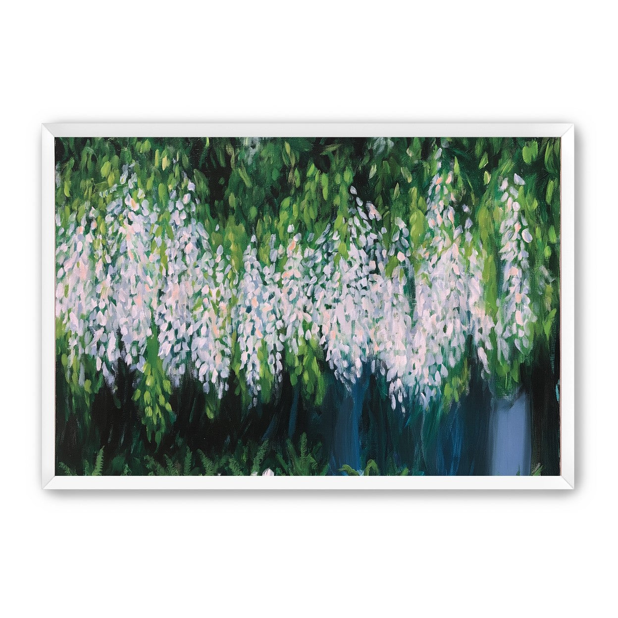 Pale blossoms in green shade