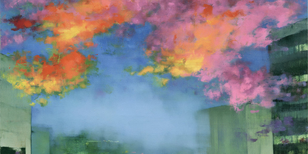 Neon clouds over rooftops