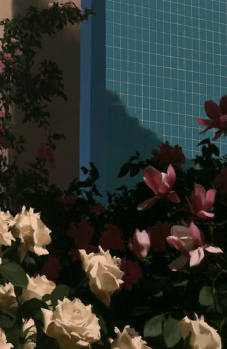 Flowers beneath the tiled wall