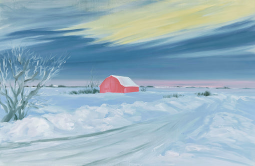 Red barn beneath winter sky