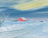 Red barn beneath winter sky