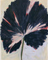 Dark petals across pale ground