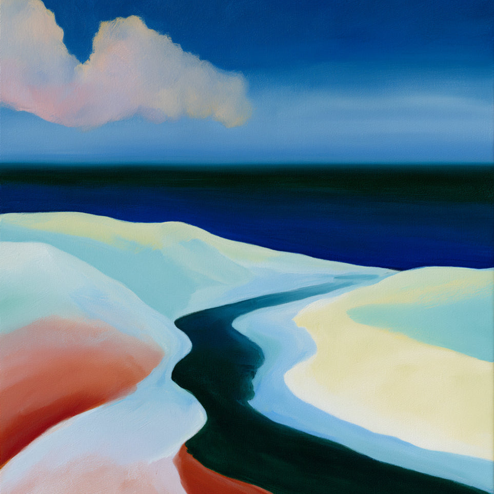 Deep blue over pale dunes