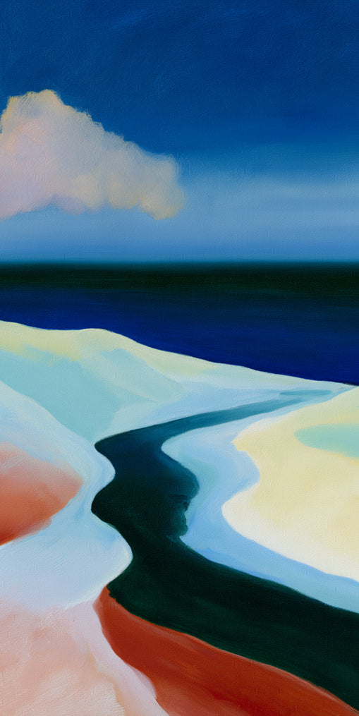 Deep blue over pale dunes