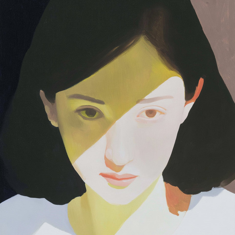 Yellow light across her face