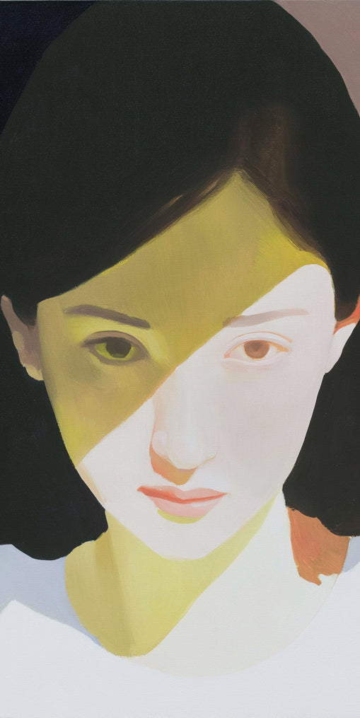 Yellow light across her face