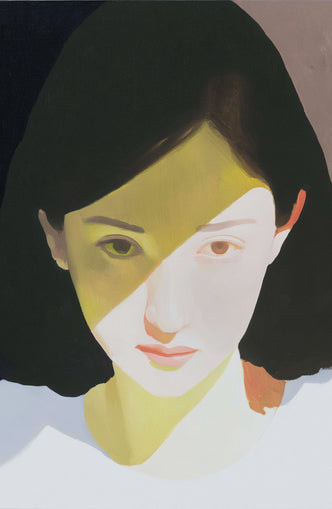 Yellow light across her face