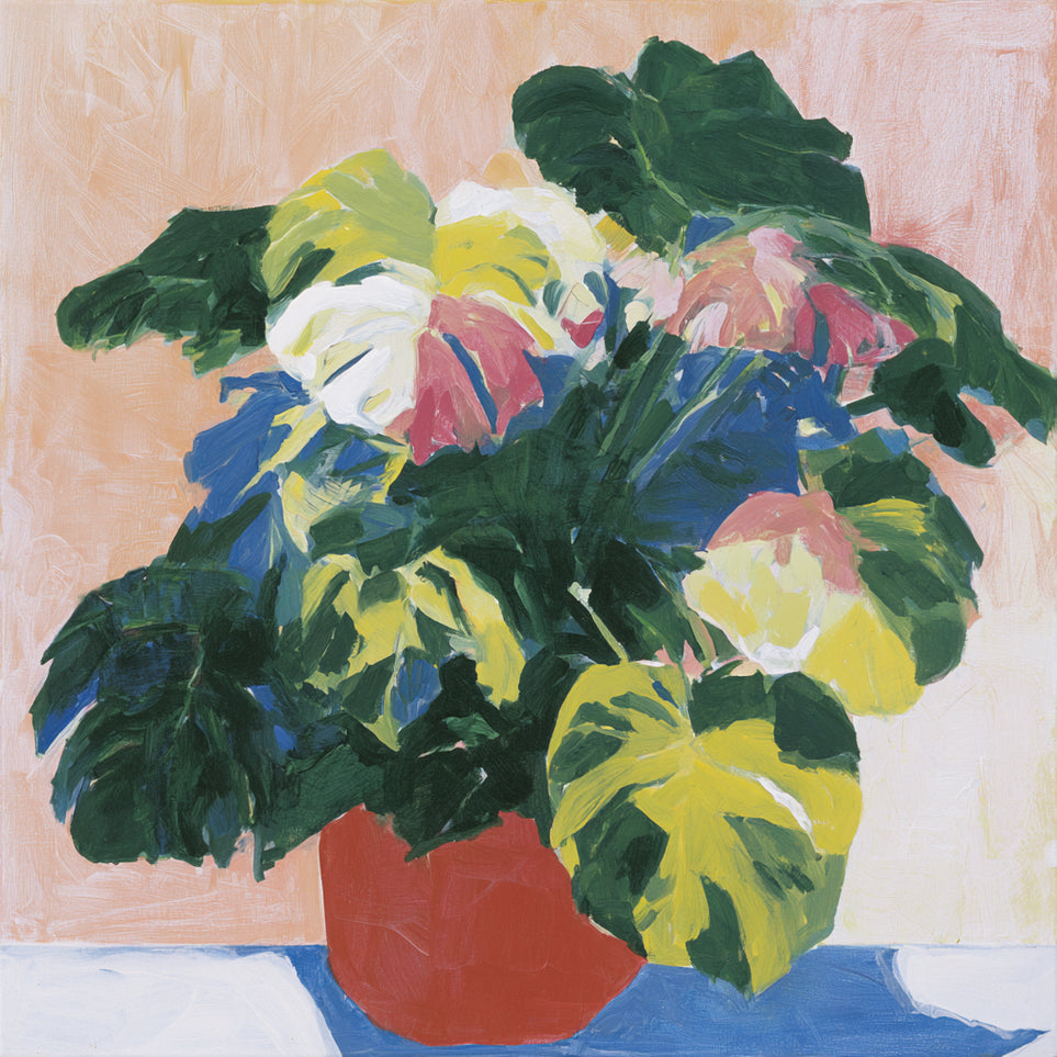 Red pot under heavy leaves