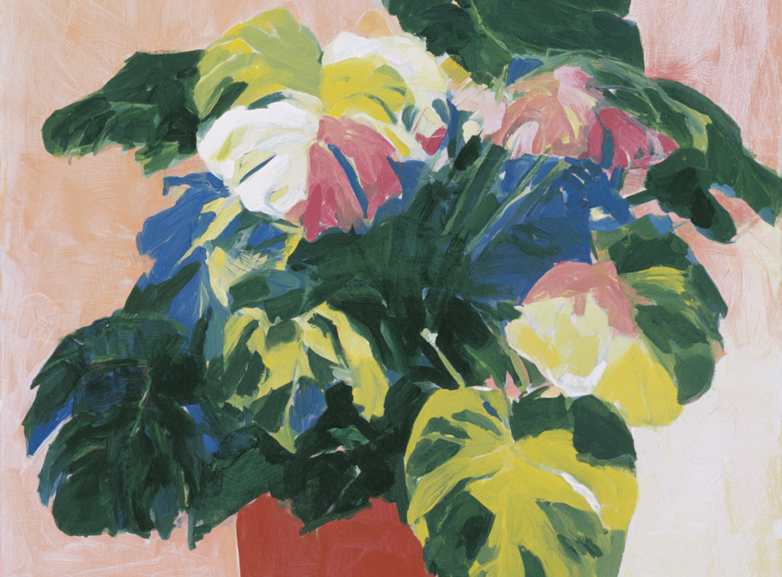 Red pot under heavy leaves