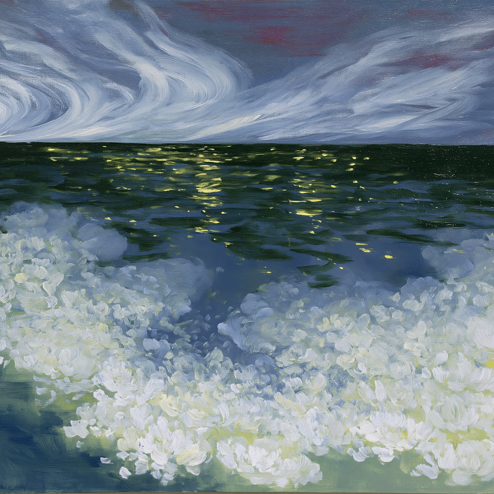 Foam and starlight at sea