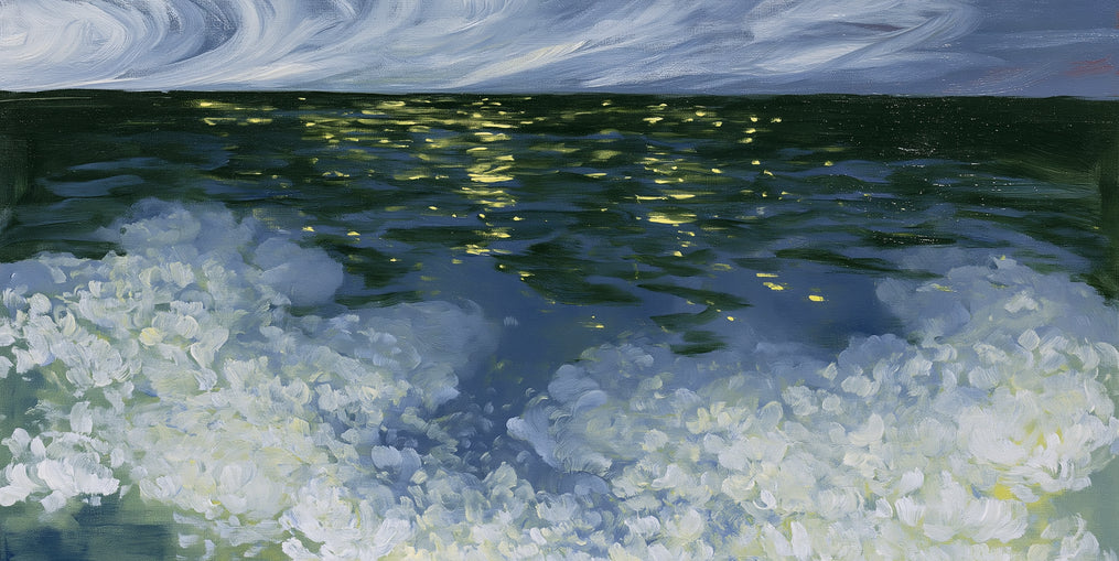 Foam and starlight at sea