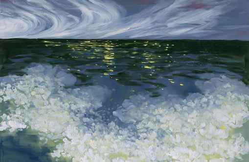 Foam and starlight at sea