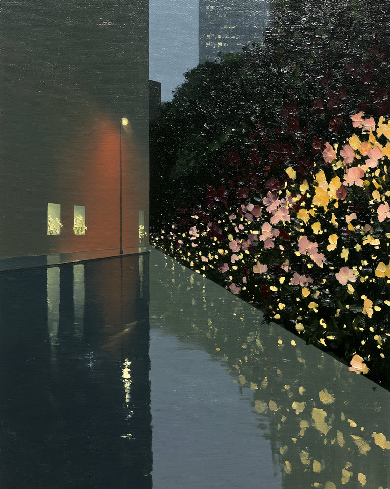 Flowers beside the wet wall
