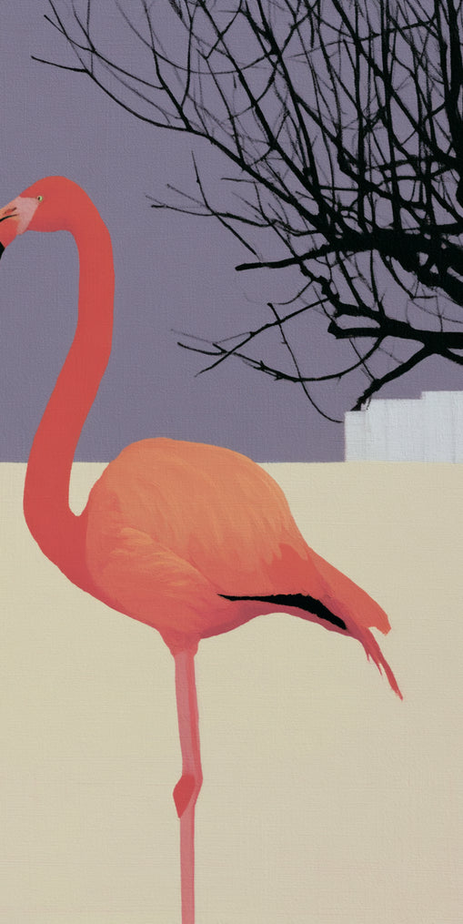A flamingo beside the bare tree
