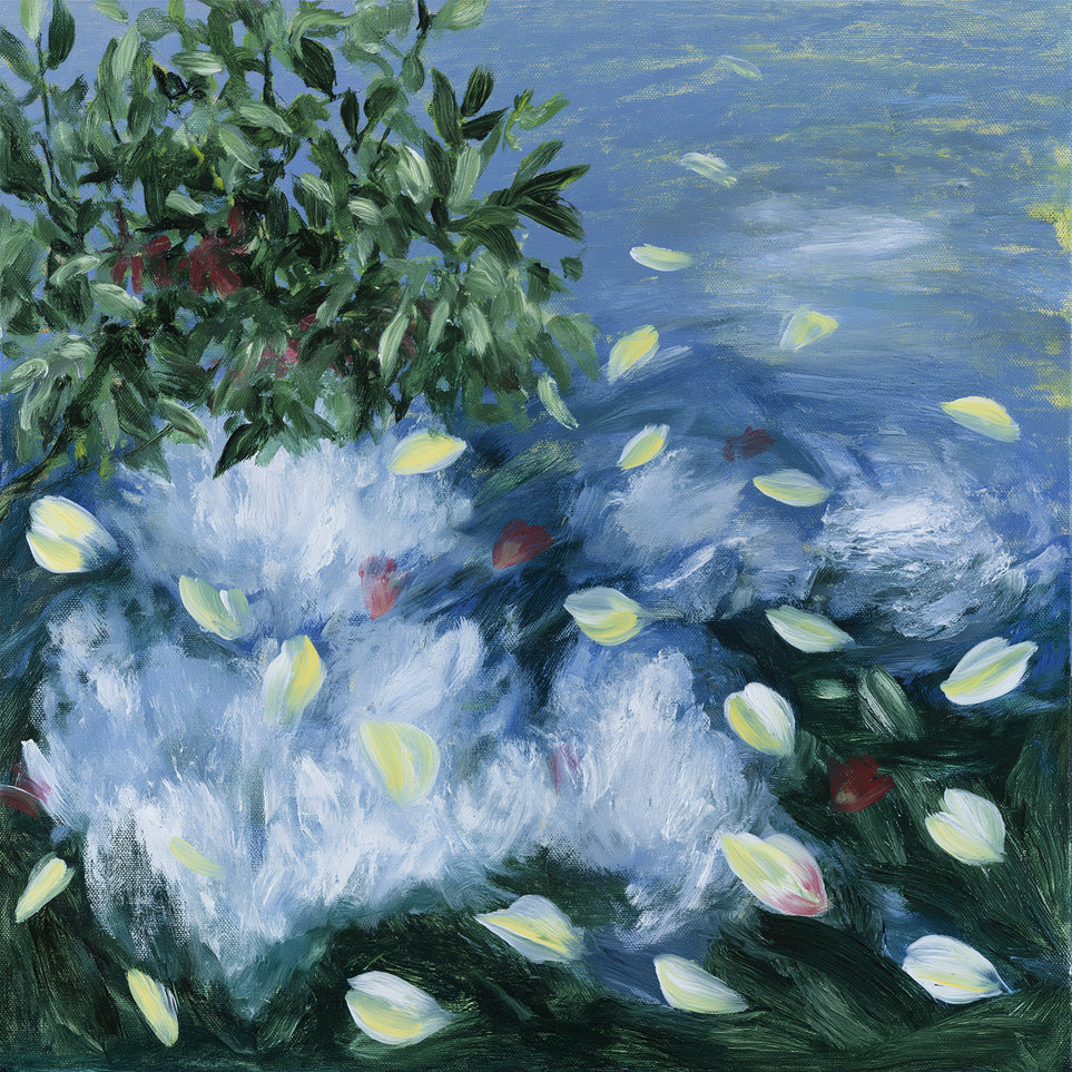 Petals across the blue water