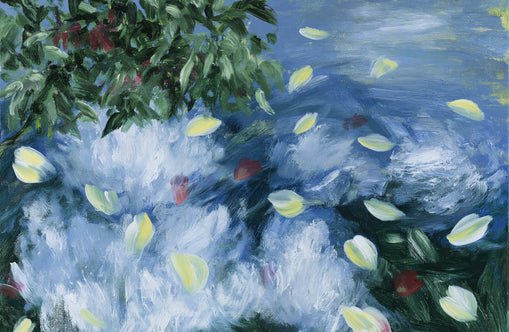 Petals across the blue water