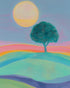 The sun behind the tree