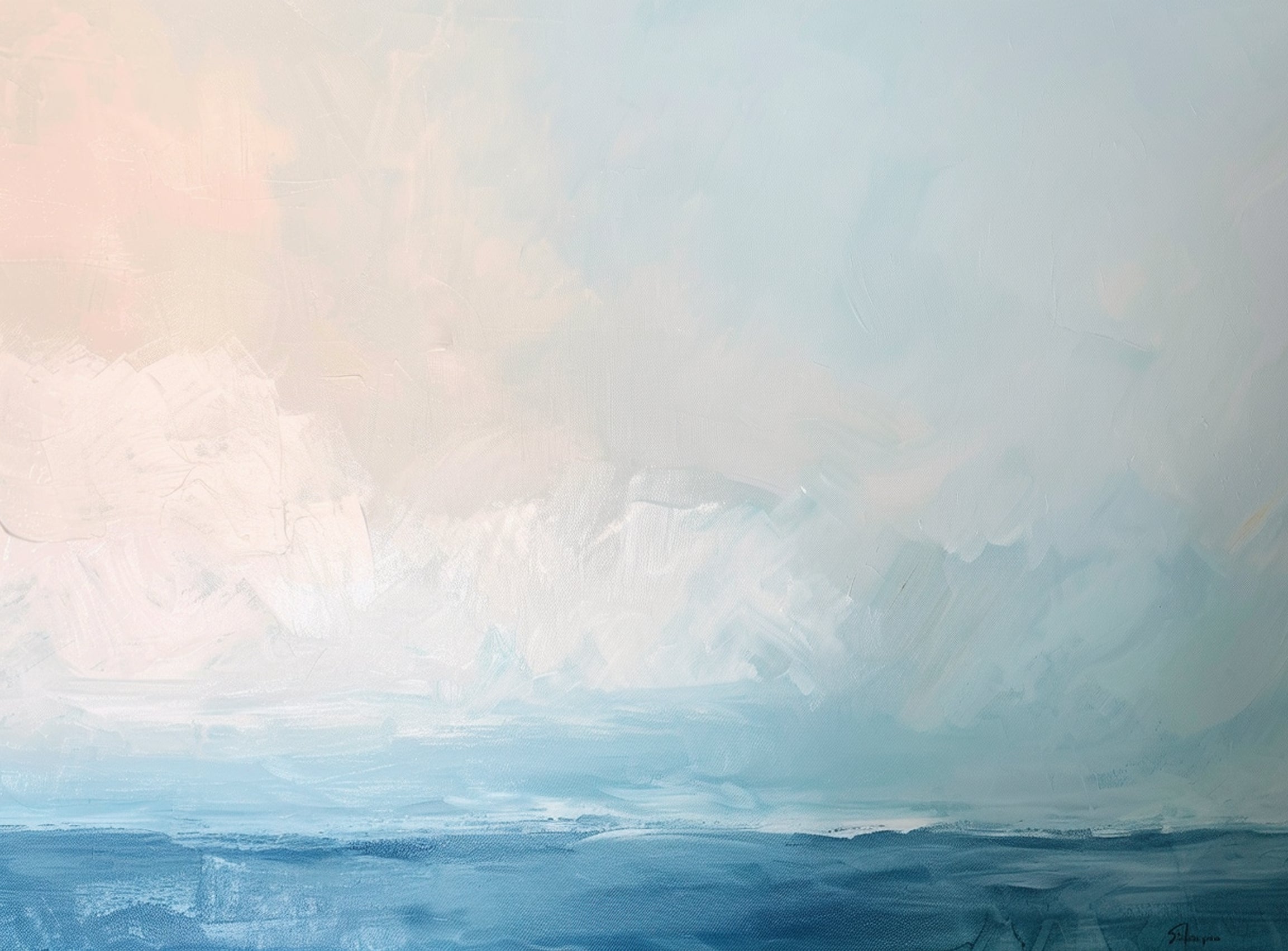 Quiet sea under pale sky