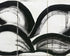 Black arcs across white panels