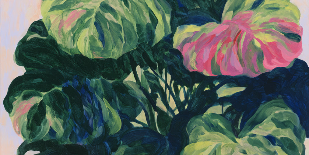 Pink light on green leaves