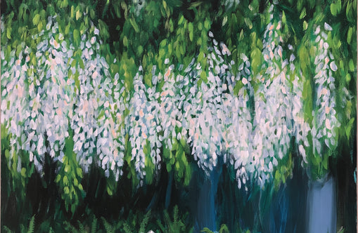 Pale blossoms in green shade