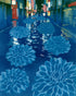 Neon spills into blue floodwater