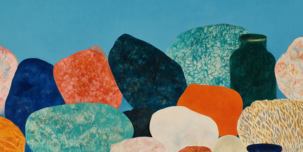 Stones beneath a blue field