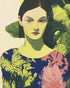 Green leaves behind her portrait