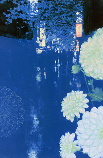 White blooms on blue canal