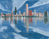 Sailboats before the mirrored skyline
