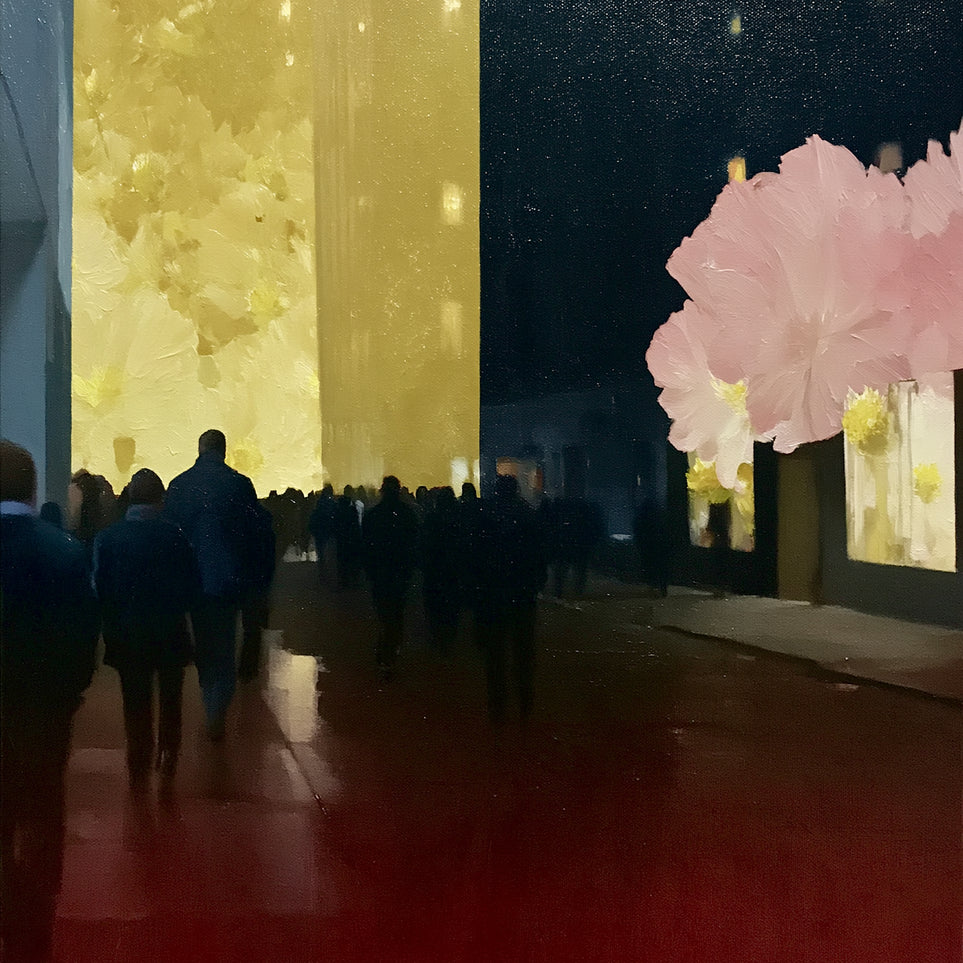 Crowd beneath the glowing wall