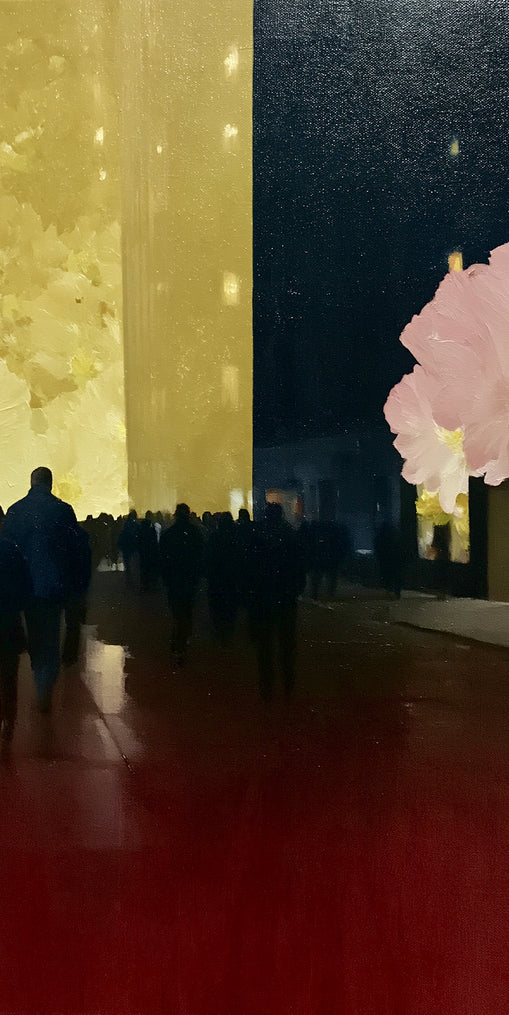 Crowd beneath the glowing wall