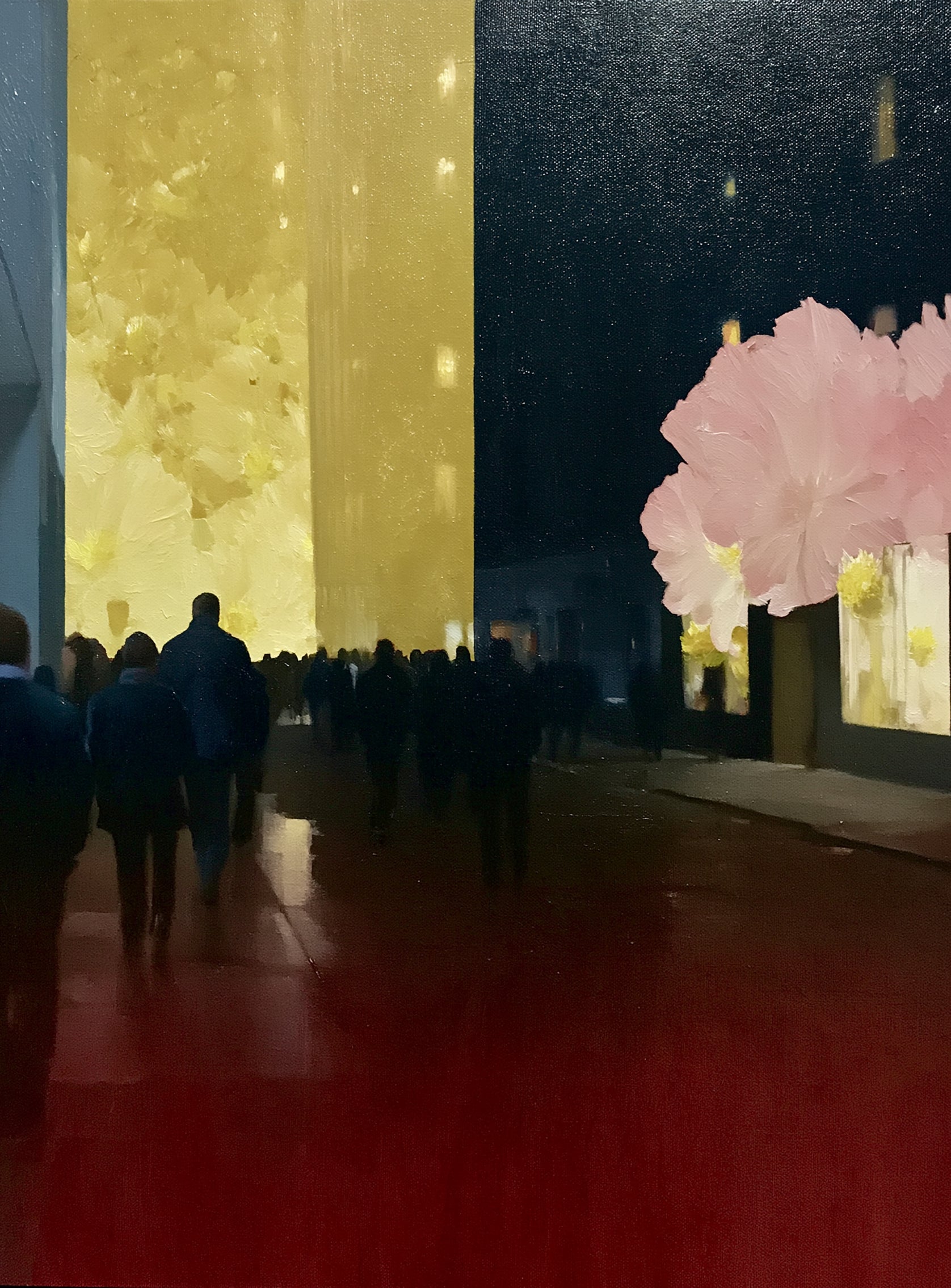 Crowd beneath the glowing wall